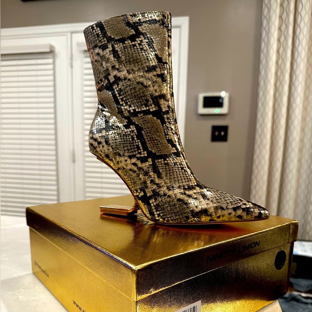Brand new size 8 snakeskin bootie